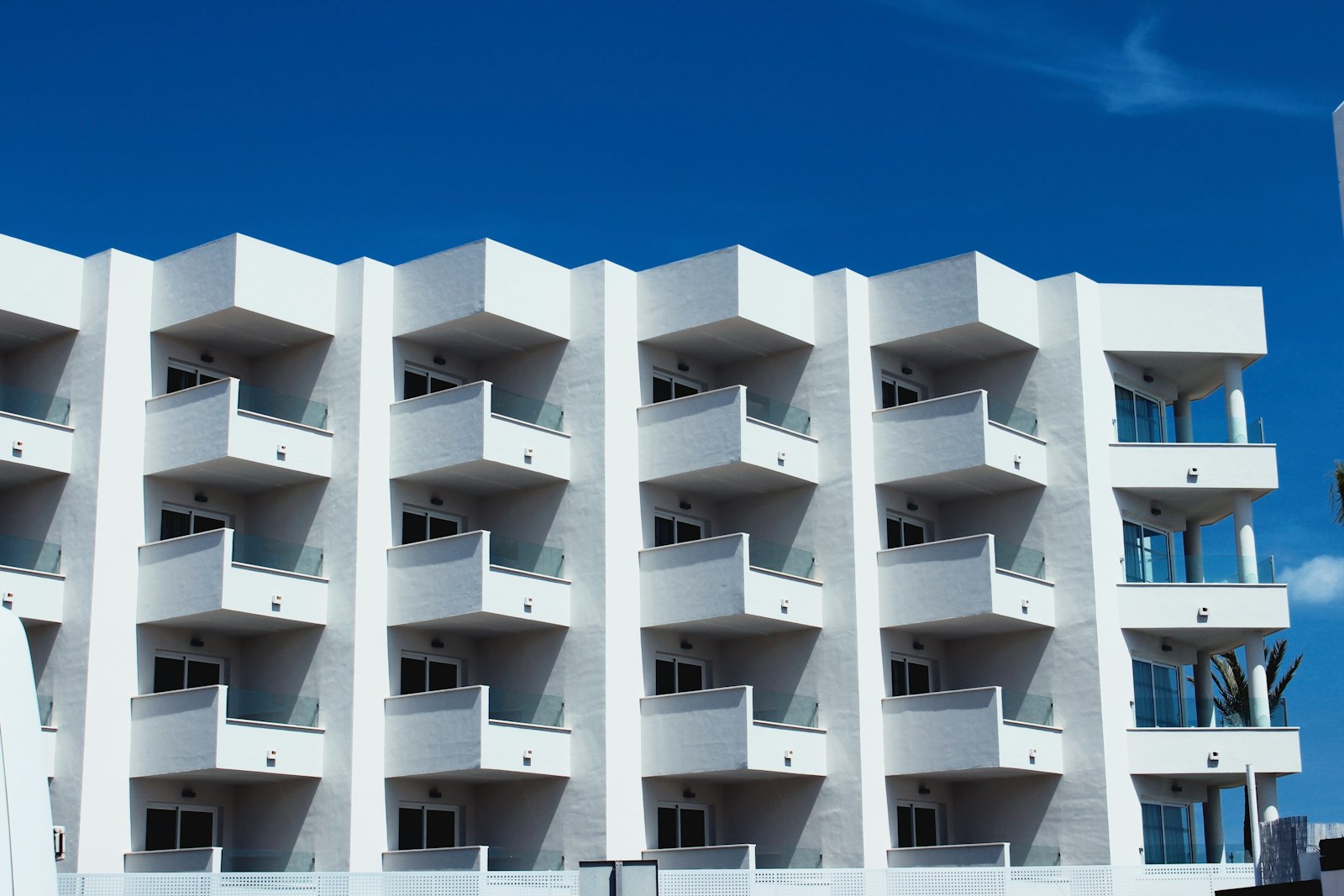 Modern residential building under a clear sky in Spain